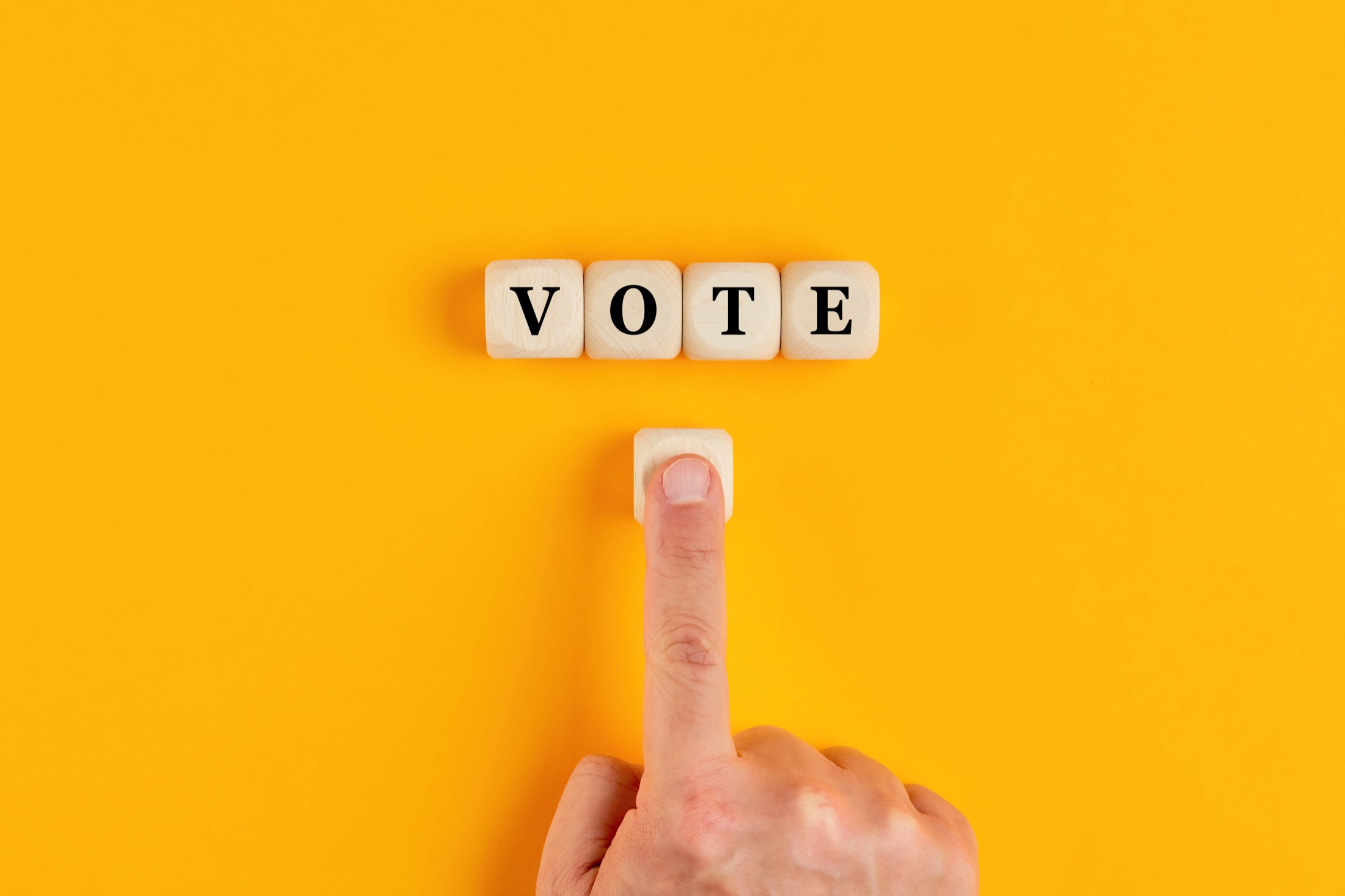 Vote spelled out on small cubes