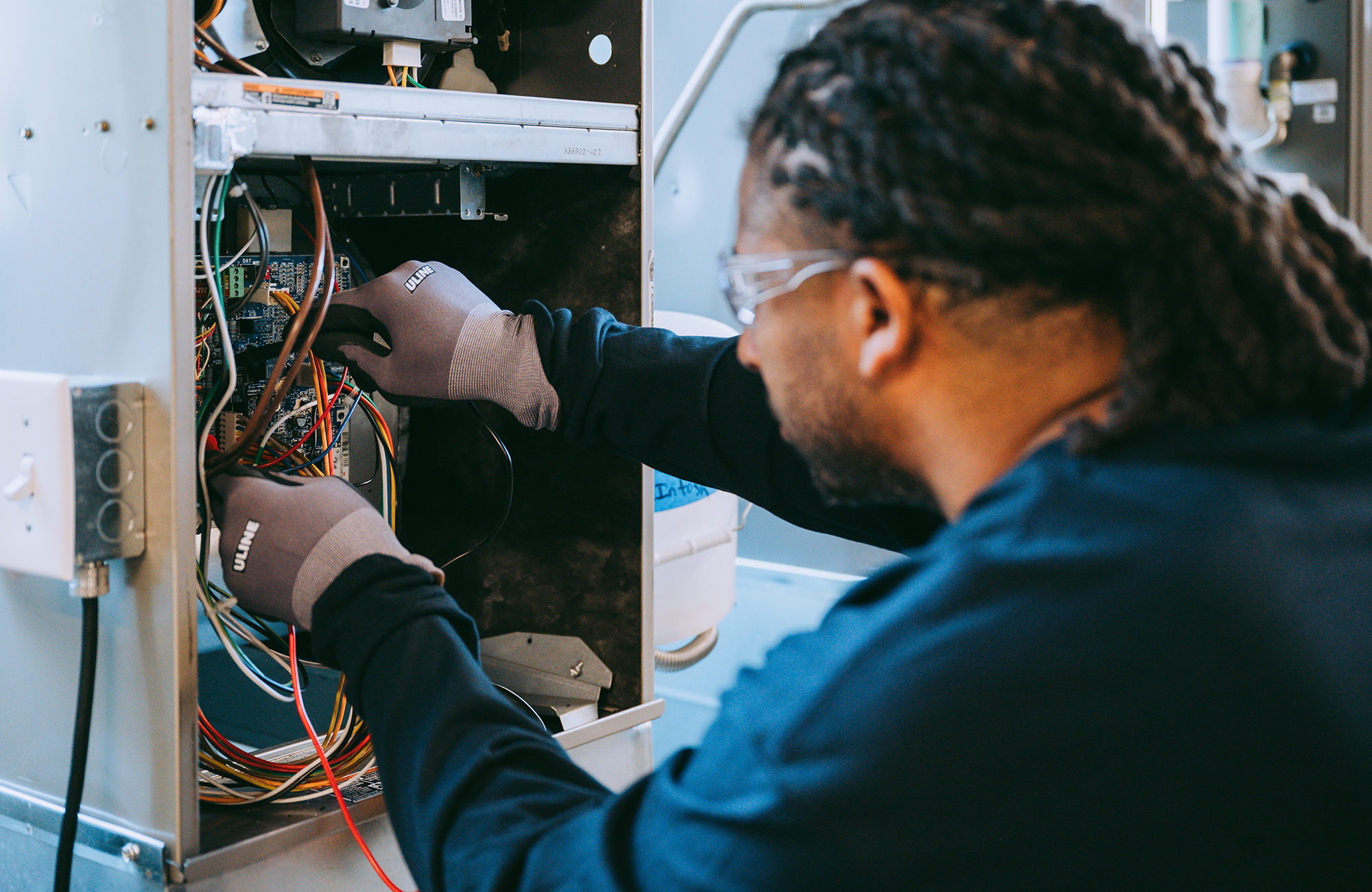 Electronics of an HVAC refrigeration unit being worked on